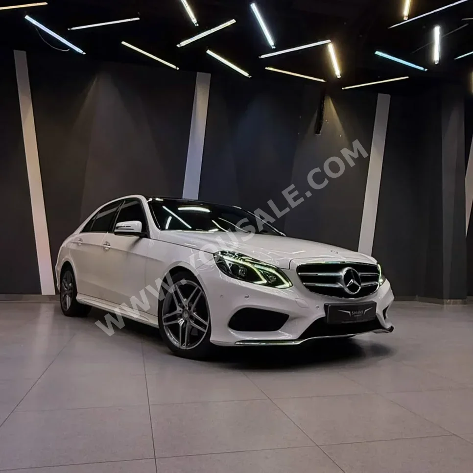 Mercedes-Benz  E-Class  300  2015  Automatic  114,000 KM  4 Cylinder  Sedan  White