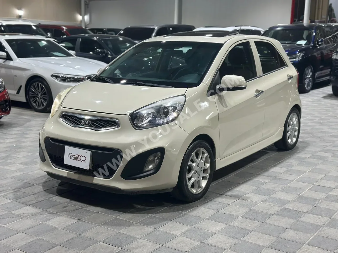 Kia  Picanto  2013  Automatic  144,000 KM  4 Cylinder  Hatchback  Beige