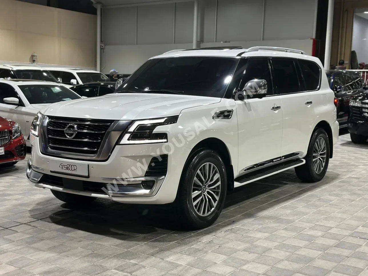 Nissan  Patrol  Platinum  2021  Automatic  120,000 KM  6 Cylinder  SUV  White