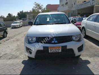 Mitsubishi  L 200  2013  Pick Up  Manual  4  50,000  RWD  White  Gasoline