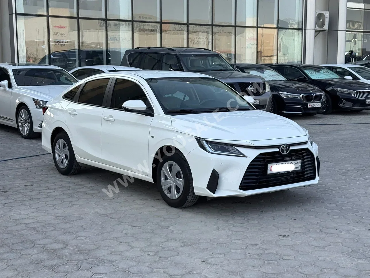 Toyota  Yaris  2024  Automatic  9,600 KM  4 Cylinder  Sedan  White  With Warranty