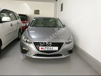 Mazda  Mazda 3  2015  Sedan  Automatic  4  40,000  FWD  Gray  Gasoline