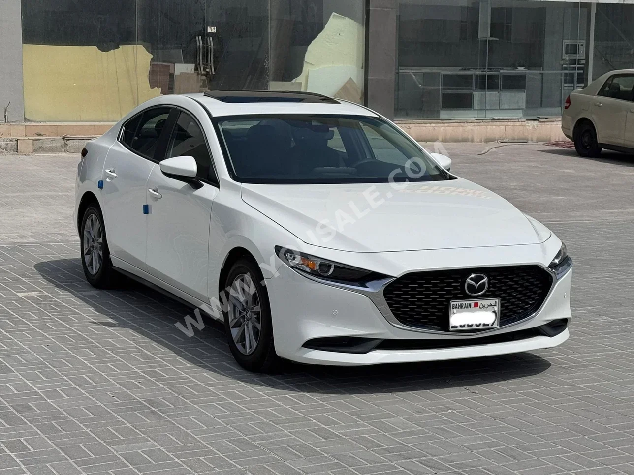 Mazda  Mazda 3  2020  Automatic  77,100 KM  4 Cylinder  Sedan  White