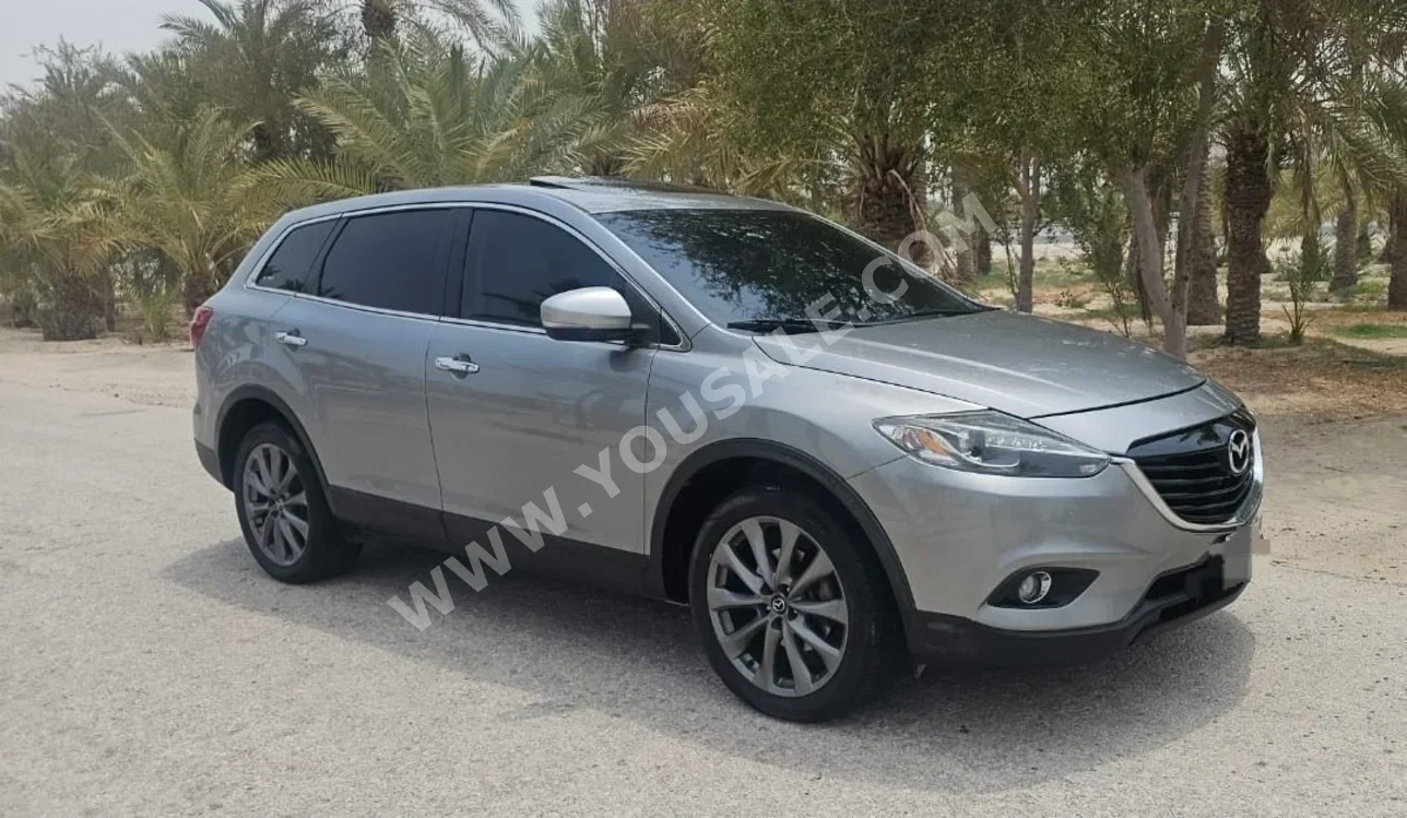 مازدا  سي اكس  9  2015  اتوماتك  215,000 كم  6 سلندر  اس يو في  رمادي