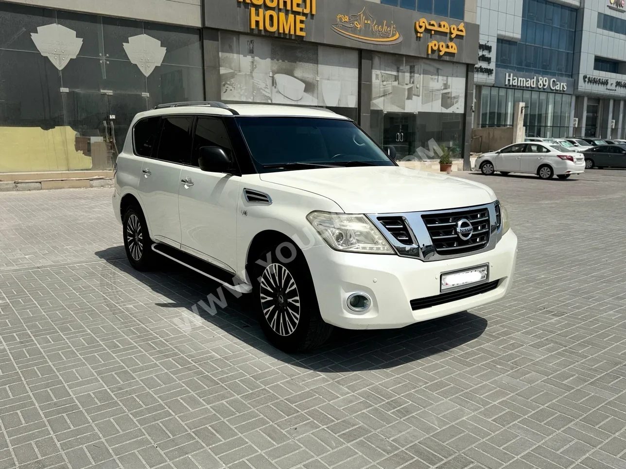 نيسان  باترول  أكس أي  2014  اتوماتك  231,850 كم  8 سلندر  اس يو في  أبيض