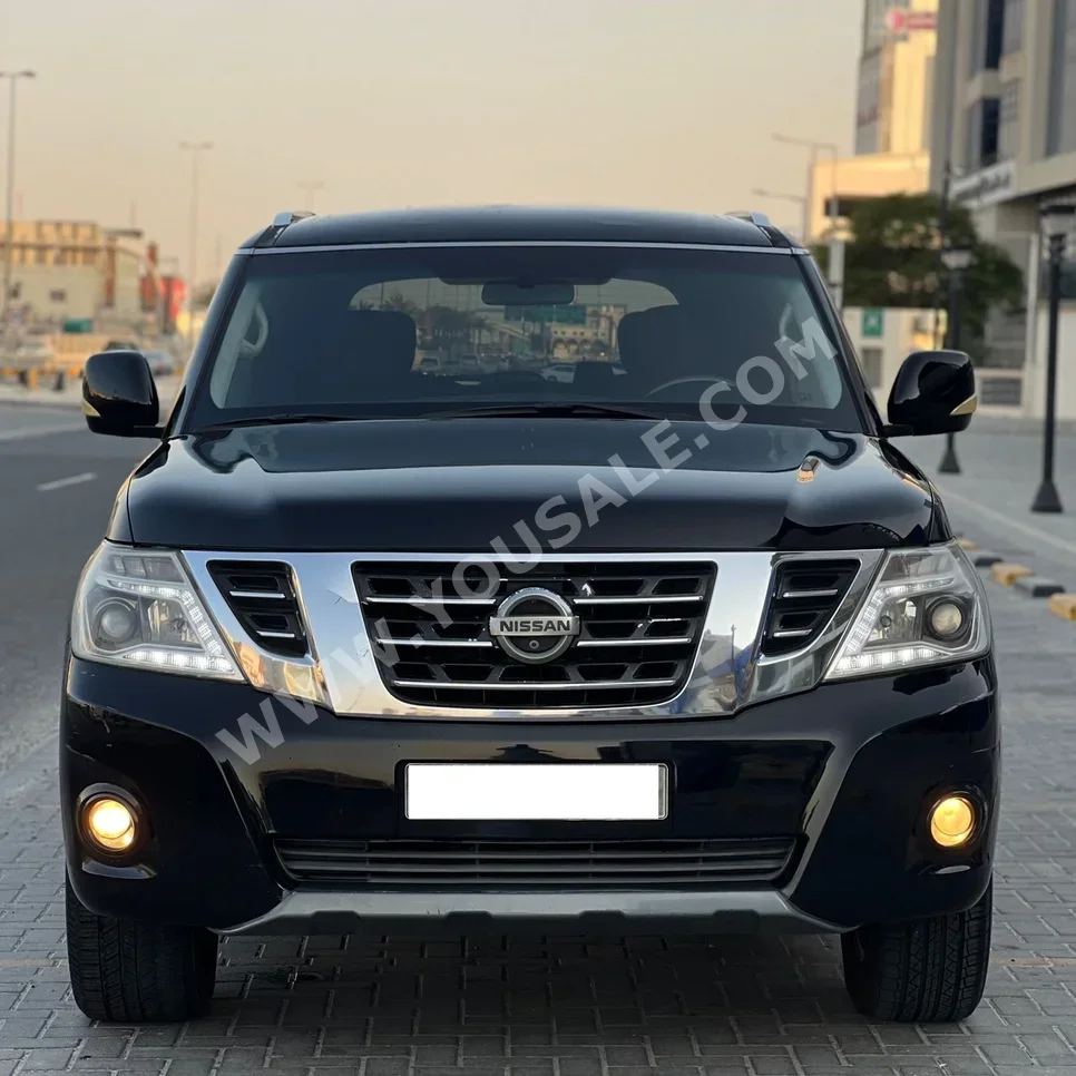Nissan  Patrol  XE  2014  Automatic  300,000 KM  8 Cylinder  SUV  Black