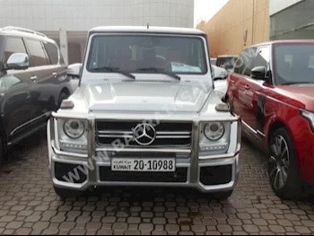 Mercedes-Benz  G-Class  55 AMG  2012  SUV  Automatic  8  100,000  4WD  Silver  Gasoline