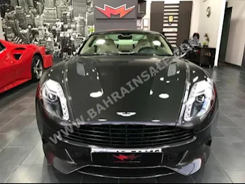 Aston Martin  Vanquish  2015  Coupe / Sport  Automatic  12  2,000  RWD  Gray  Gasoline