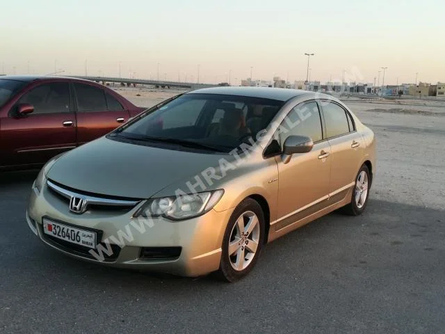 Honda  Civic  EXI  2007  Sedan  Automatic  4  153,000  FWD  Gold  Gasoline