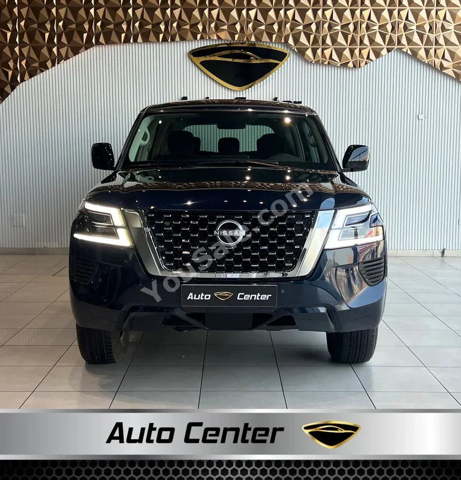 Nissan  Patrol  XE  2024  Automatic  12,000 KM  6 Cylinder  SUV  Blue  With Warranty