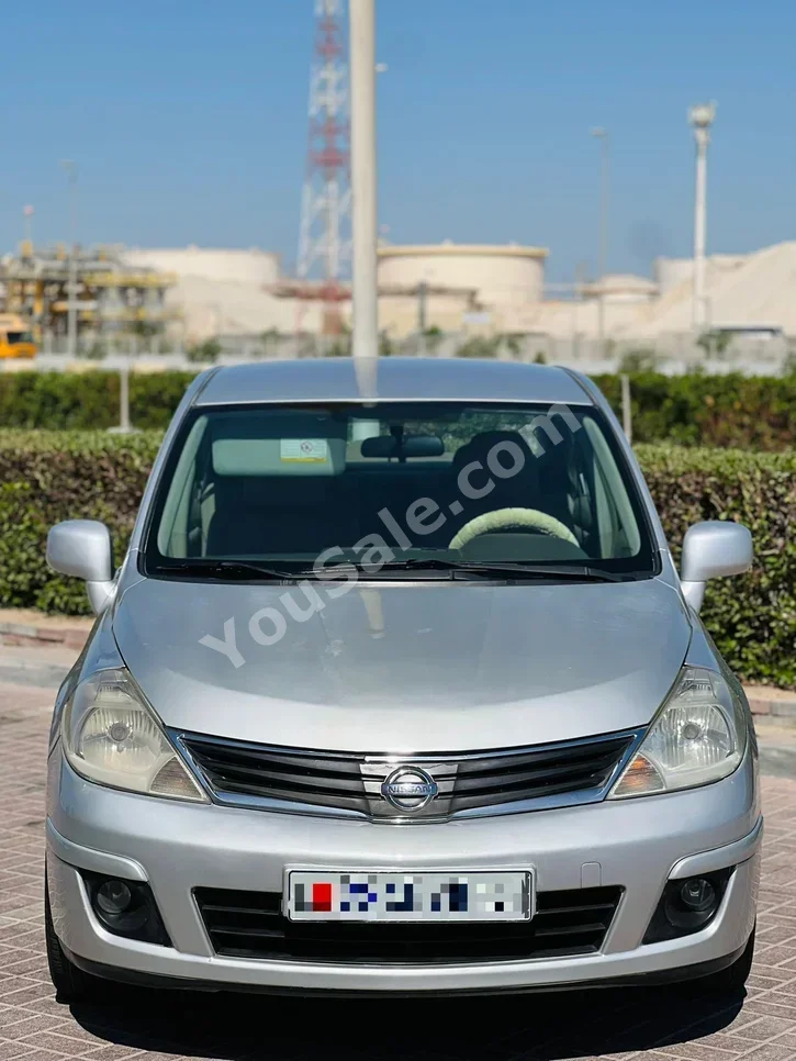 Nissan  Tiida  2012  Automatic  250,000 KM  4 Cylinder  Sedan  Silver