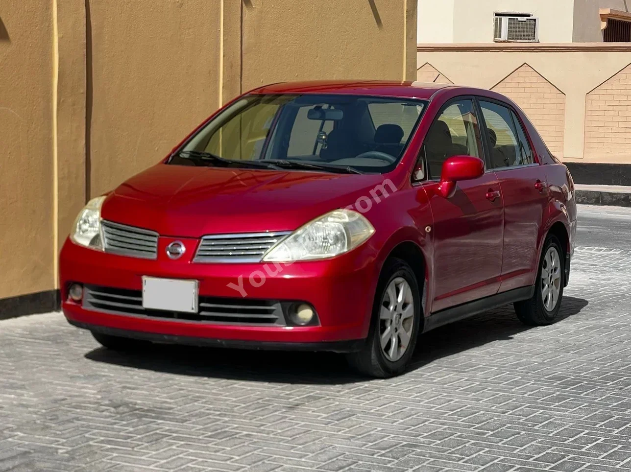 نيسان تيدا 2008 اتوماتك 244,000 كم 4 سلندر سيدان أحمر