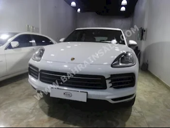 بورش  كيان  2018  اس يو في  اتوماتك  6  0  دفع رباعي  أبيض  بنزين