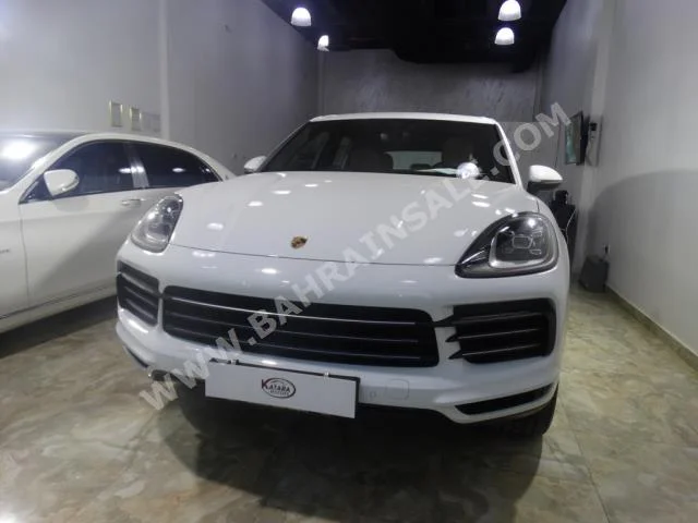بورش  كيان  2018  اس يو في  اتوماتك  6  0  دفع رباعي  أبيض  بنزين