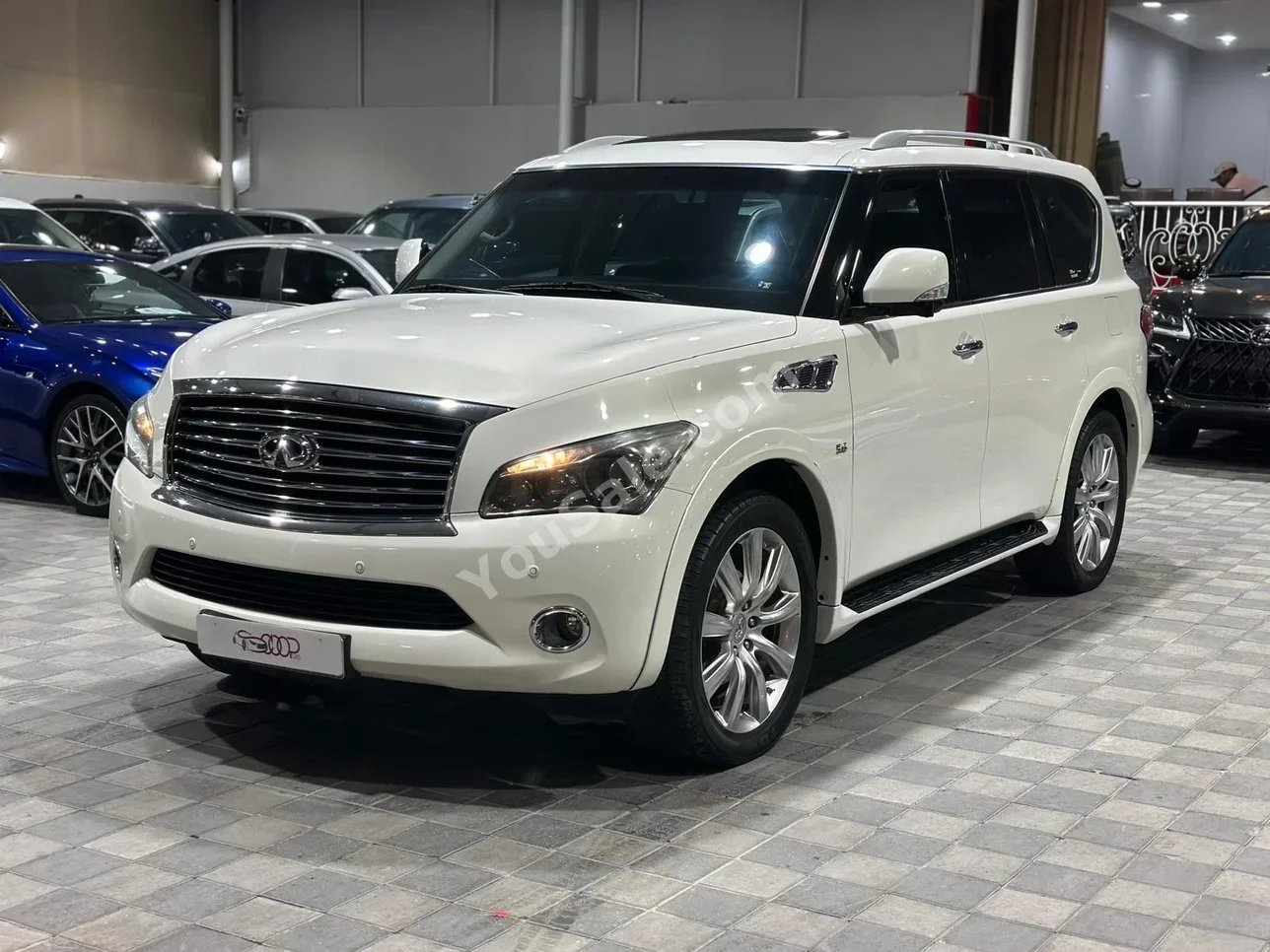 Infiniti  QX  80  2014  Automatic  198,000 KM  8 Cylinder  SUV  White