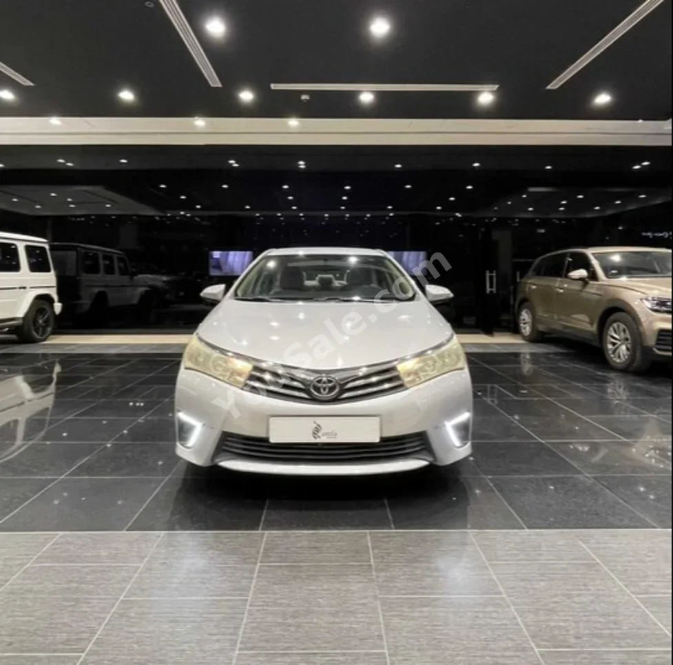 Toyota  Corolla  GLI  2015  Automatic  178,000 KM  4 Cylinder  Sedan  Silver