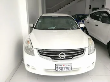 Nissan  Altima  2.5 S  2012  Sedan  Automatic  4  76,000  FWD  Pearl  Gasoline