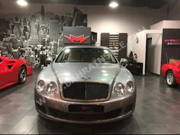 Bentley  GT  Speed  2012  Sedan  Automatic  12  63,000  RWD  Gray  Gasoline