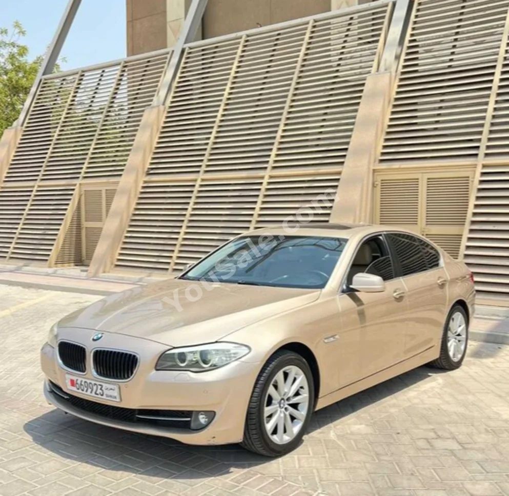 BMW  5-Series  520i  2013  Automatic  166,000 KM  4 Cylinder  Sedan  Light Gold