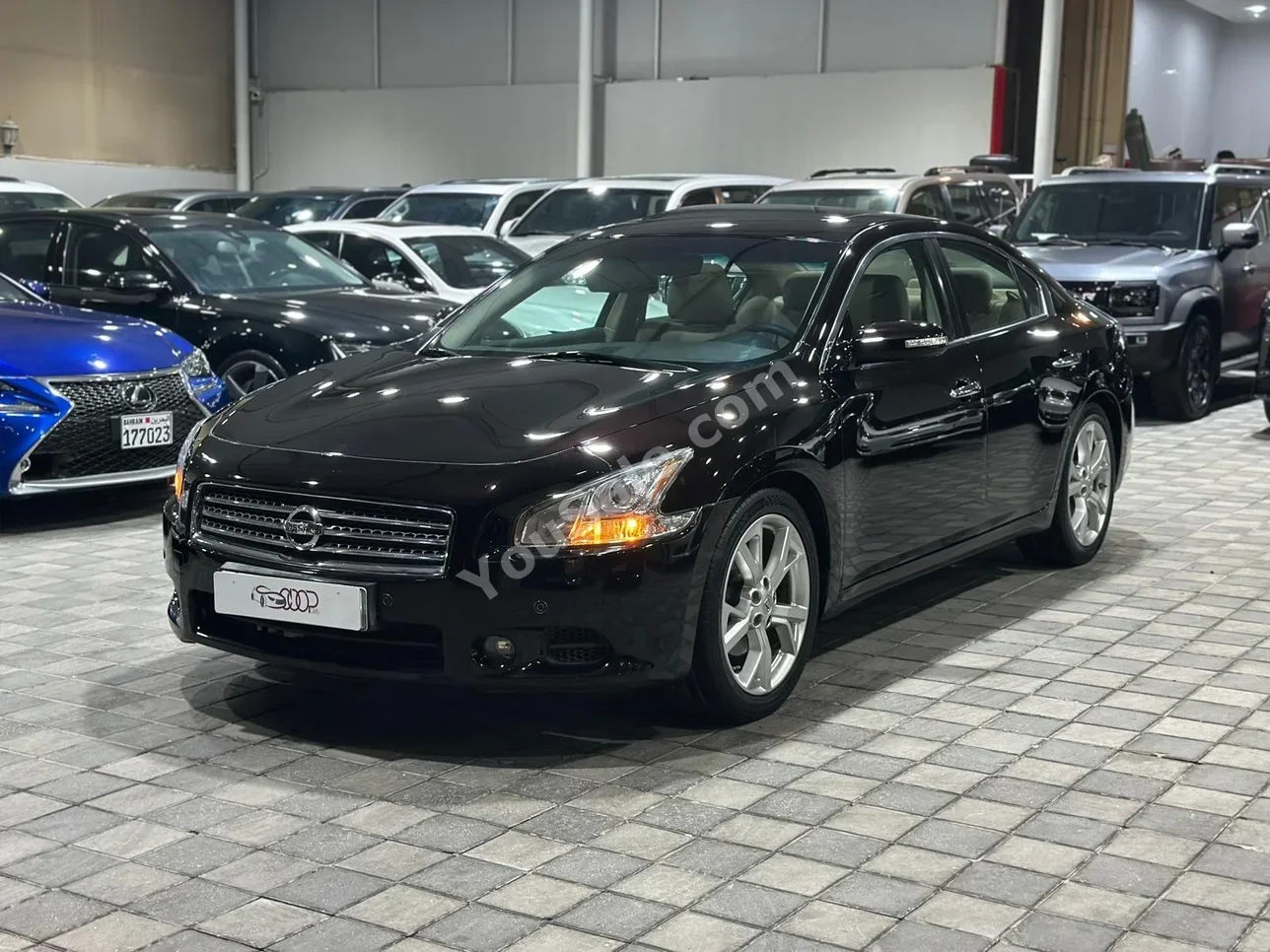 Nissan  Maxima  2012  Automatic  135,000 KM  4 Cylinder  SUV  Black