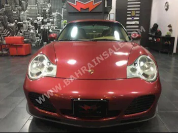 Porsche  911  Turbo  2001  Coupe / Sport  Automatic  6  85,000  RWD  Maroon  Gasoline