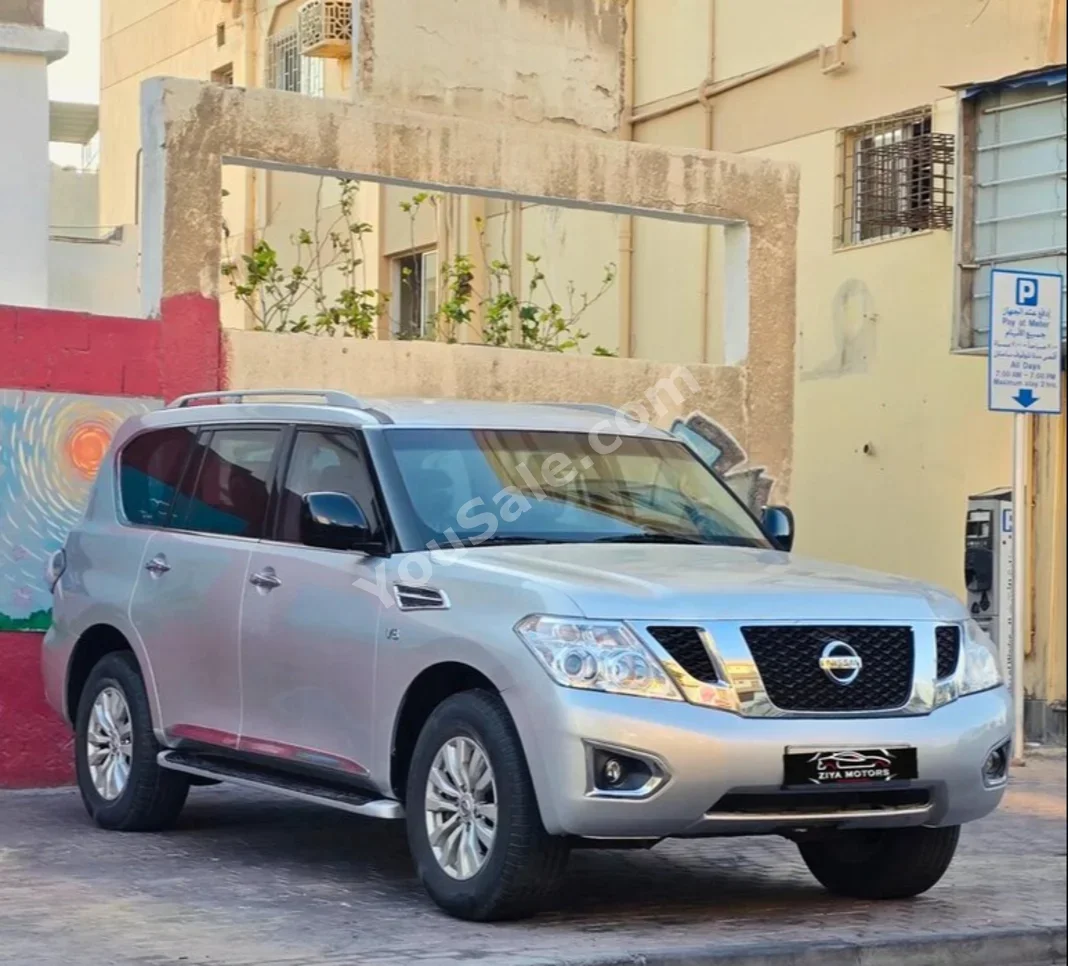 Nissan  Patrol  2015  Automatic  332,600 KM  4 Cylinder  SUV  Silver