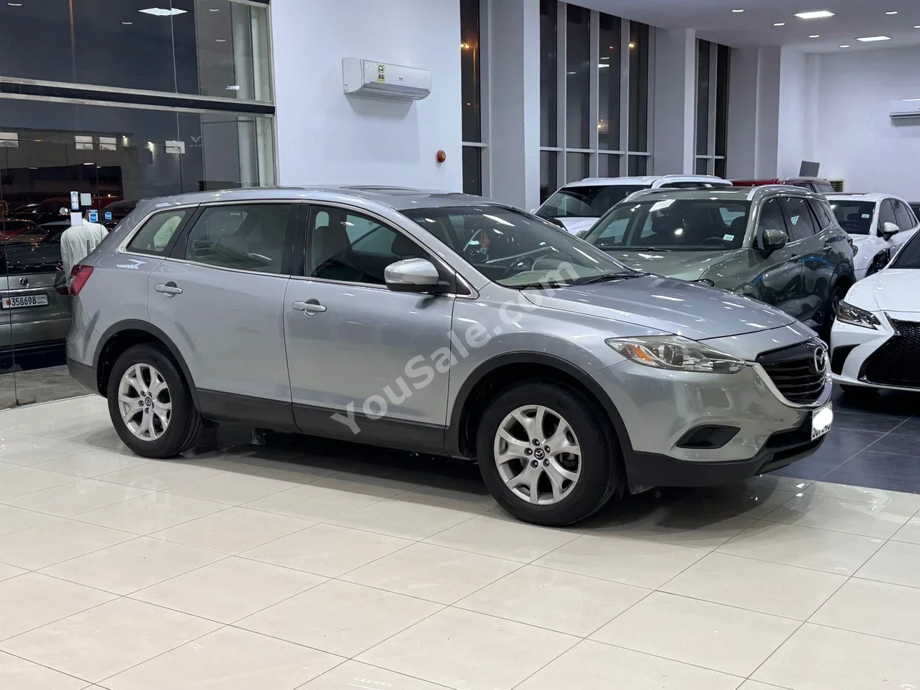 Mazda  CX  9  2015  Automatic  67,150 KM  6 Cylinder  SUV  Silver