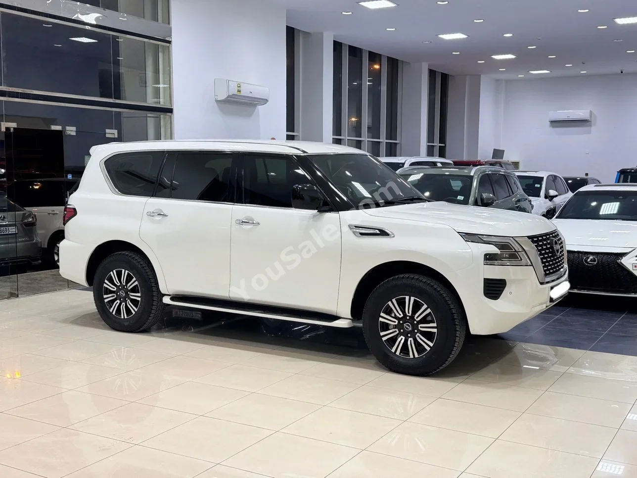 Nissan  Patrol  XE  2022  Automatic  103,650 KM  6 Cylinder  SUV  White