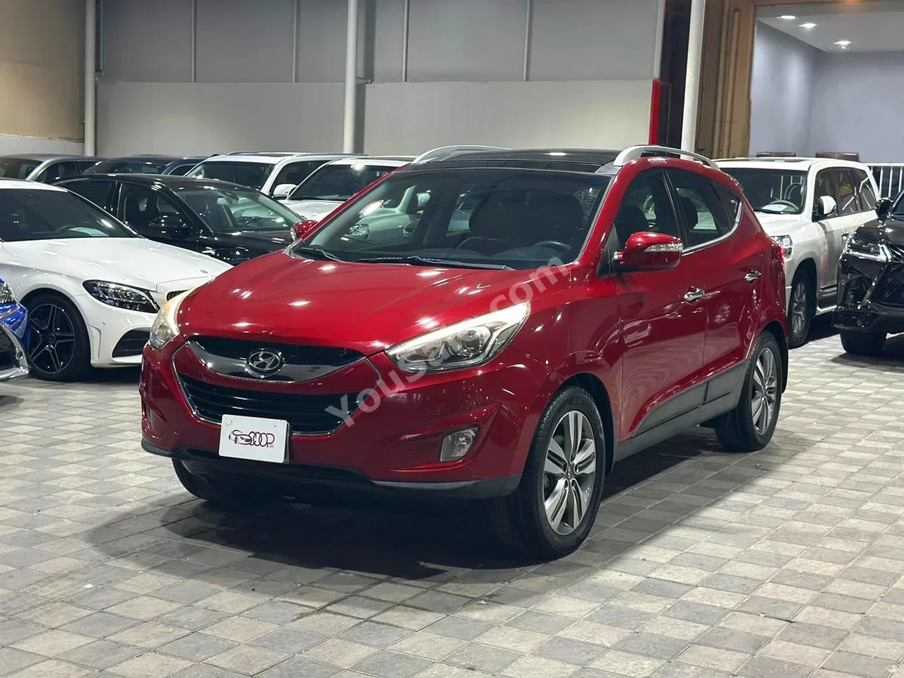 Hyundai  Tucson  2015  Automatic  149,000 KM  4 Cylinder  SUV  Red