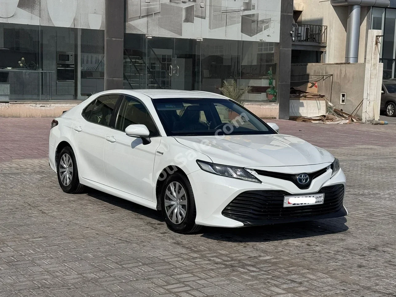 Toyota  Camry  HAYBRID  2021  Automatic  124,200 KM  4 Cylinder  Sedan  White
