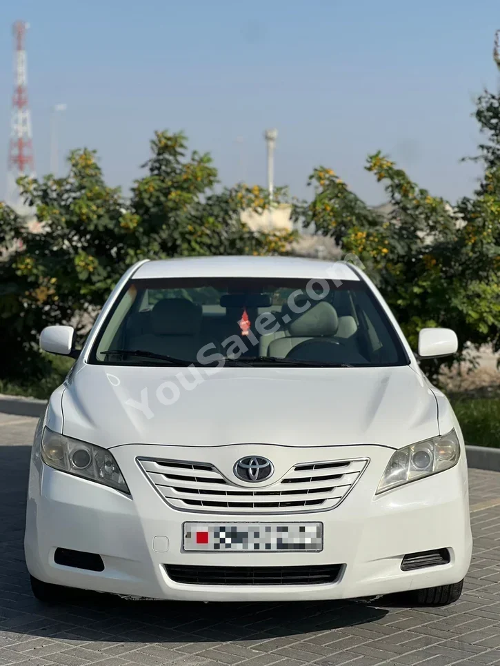 Toyota  Camry  GL  2009  Automatic  270,000 KM  4 Cylinder  Sedan  White