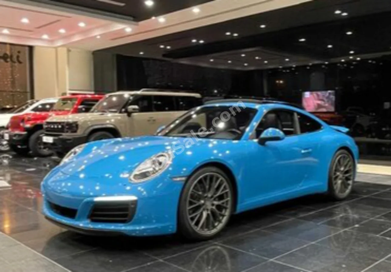 بورش  911  كاريرا  2017  اتوماتك  128,000 كم  6 سلندر  كوبيه \ سبورت  ازرق
