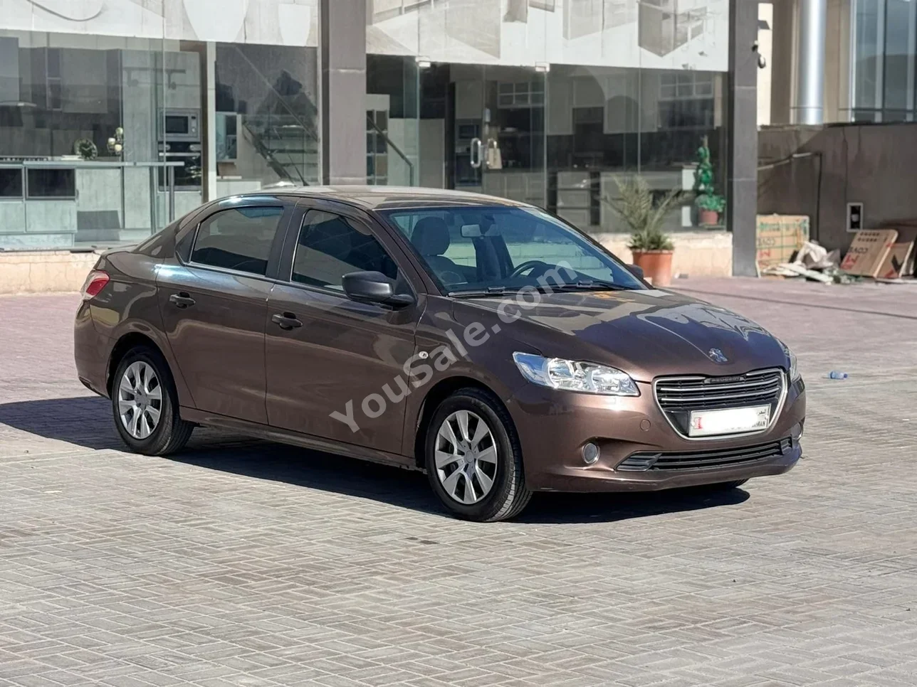 Peugeot  301  2016  Automatic  76,450 KM  4 Cylinder  Sedan  Brown