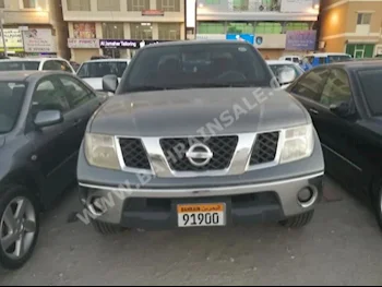 Nissan  Navaro  SE  2009  Pick Up  Manual  6  100,000  RWD  Gray  Gasoline