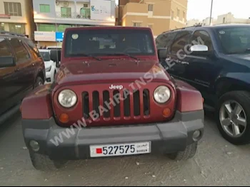 Jeep  Wrangler  Sahara  2007  SUV  Automatic  6  90,000  4WD  Maroon  Gasoline