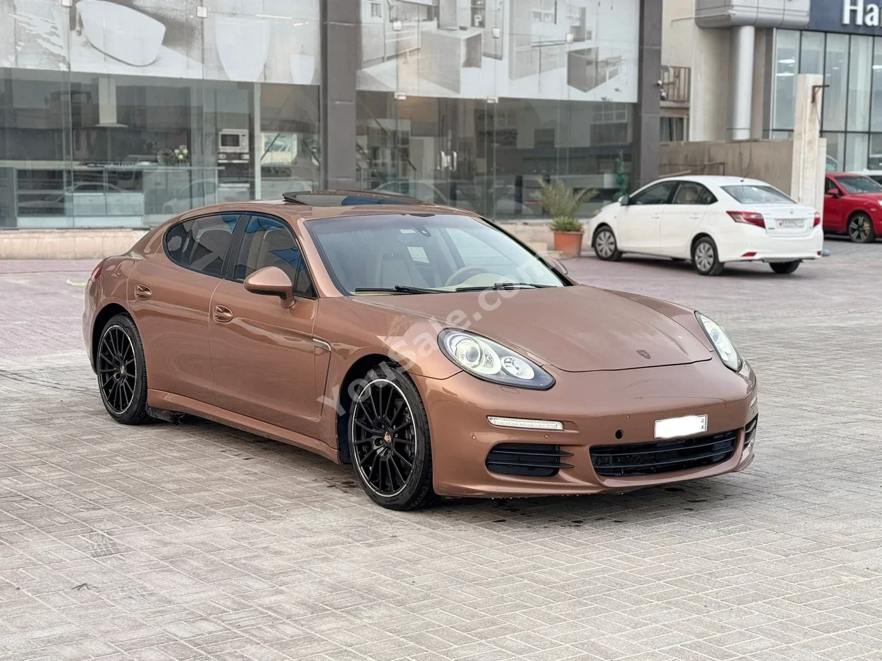 بورش بانميرا 2014 اتوماتك 190,900 كم 6 سلندر سيدان بني