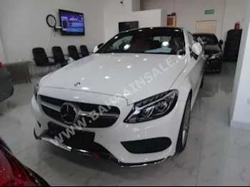 Mercedes-Benz  C-Class  250  2017  Coupe / Sport  Automatic  4  18,000  RWD  White  Gasoline