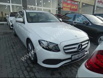 Mercedes-Benz  E-Class  200  2017  Sedan  Automatic  4  15,000  RWD  White  Gasoline