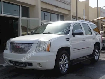 GMC  Yukon  Denali  2009  SUV  Automatic  8  206,000  4WD  White  Gasoline