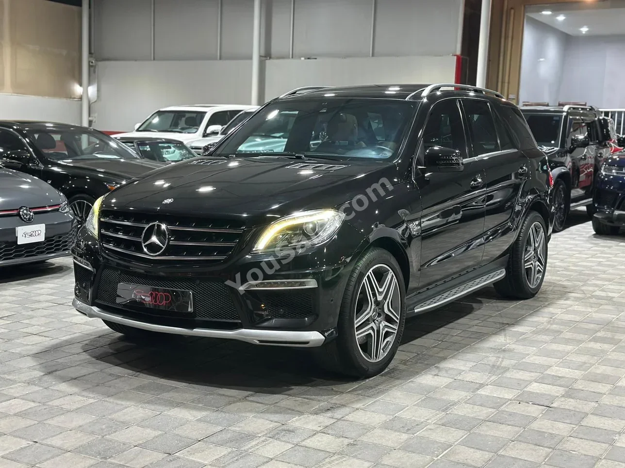 مرسيدس - بنز  ام ال - كلاس  63 AMG  2013  اتوماتك  165,000 كم  6 سلندر  اس يو في  أسود