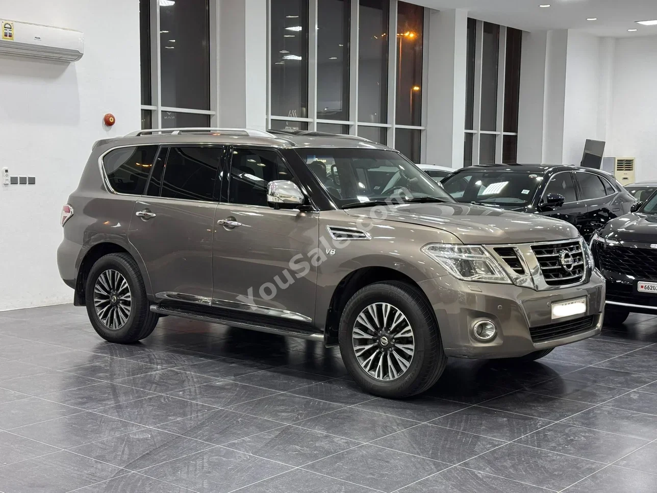 Nissan  Patrol  Platinum  2014  Automatic  220,400 KM  8 Cylinder  SUV  Brown