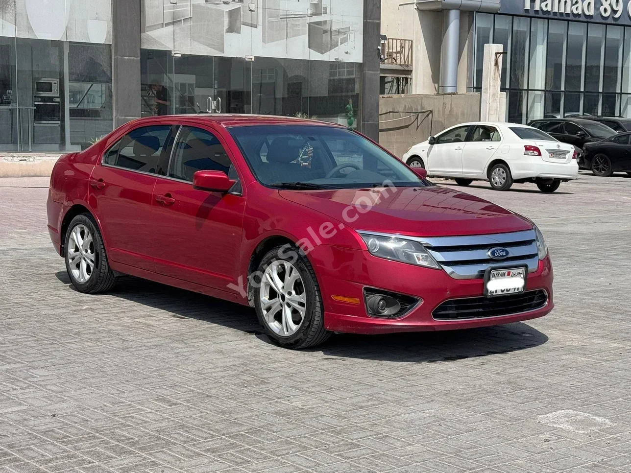 Ford  Fusion  2012  Automatic  142,100 KM  4 Cylinder  Sedan  Red