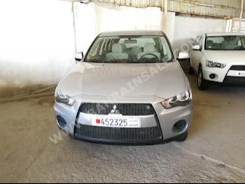 Mitsubishi  Outlander  2013  SUV  Automatic  4  65,000  FWD  Silver  Gasoline
