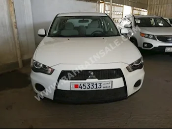 Mitsubishi  Outlander  2013  SUV  Automatic  4  84,000  FWD  White  Gasoline