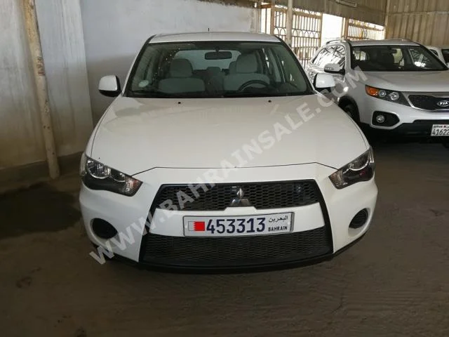 Mitsubishi  Outlander  2013  SUV  Automatic  4  84,000  FWD  White  Gasoline