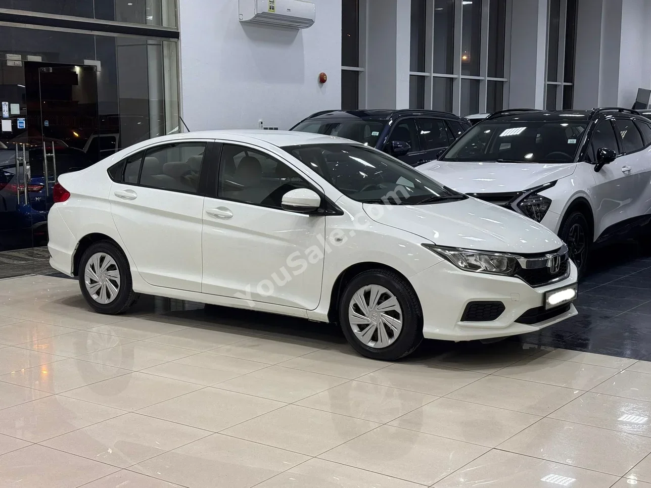 Honda  City  2019  Automatic  63,900 KM  4 Cylinder  Sedan  White