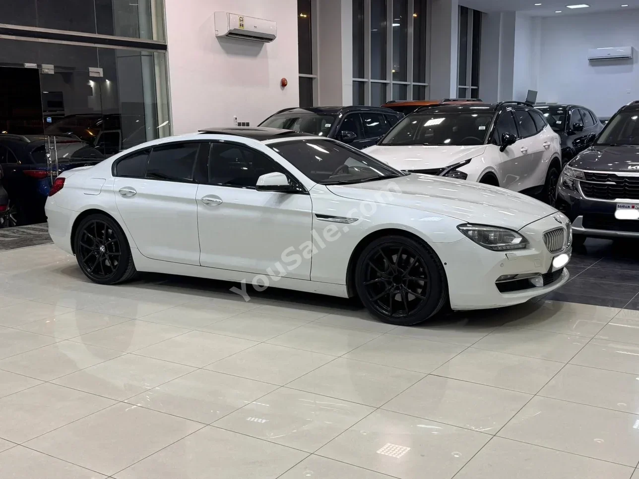 بي ام دبليو  الفئة - السادسة  650i  2015  اتوماتك  218,150 كم  8 سلندر  سيدان  أبيض