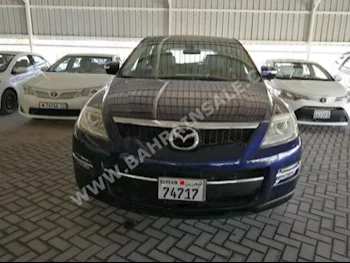 Mazda  CX  9  2006  SUV  Automatic  6  200,000  FWD  Blue  Gasoline