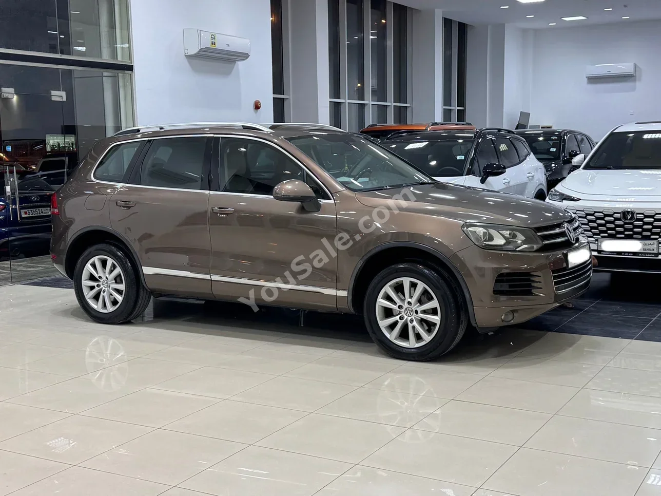 Volkswagen  Touareg  2012  Automatic  199,500 KM  6 Cylinder  SUV  Brown