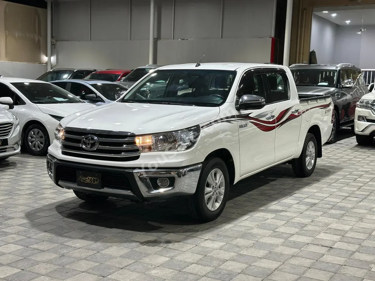 Toyota  Hilux  2020  Automatic  59,000 KM  4 Cylinder  Pick Up  White